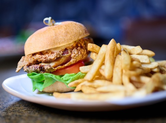 a burger and fries on a plate