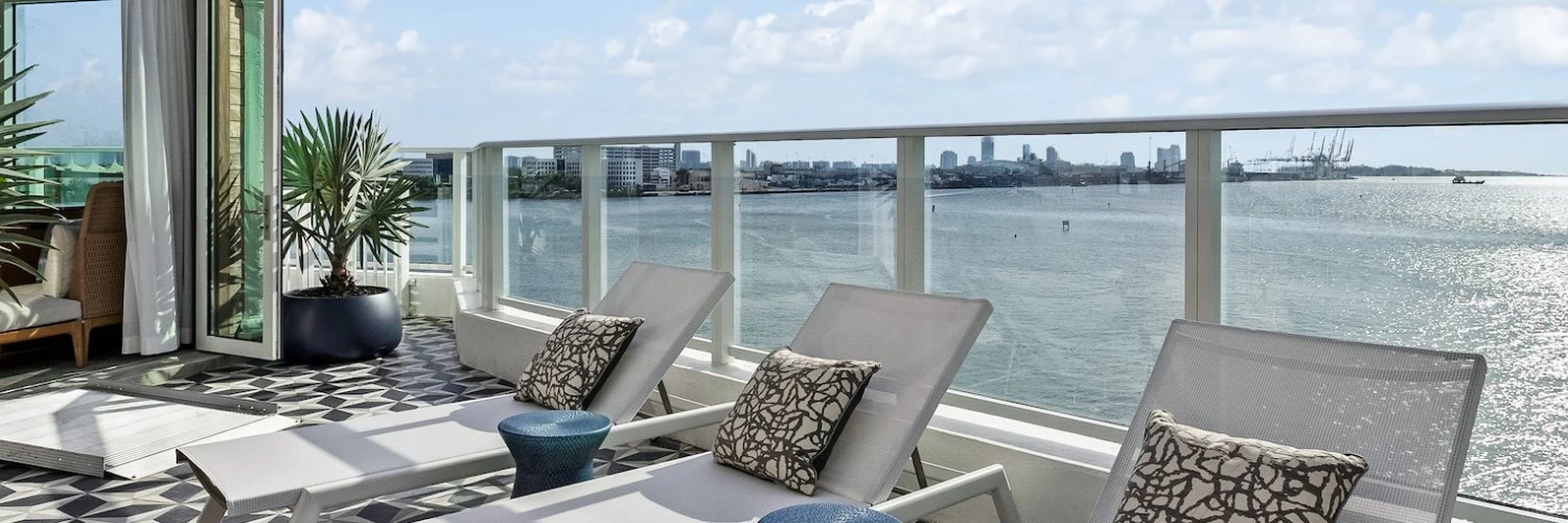 chairs on a deck overlooking water