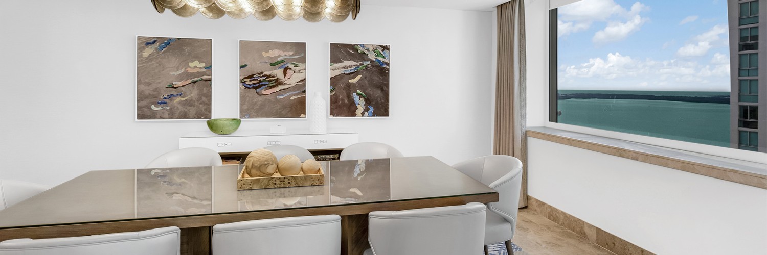 a room with a table and chairs