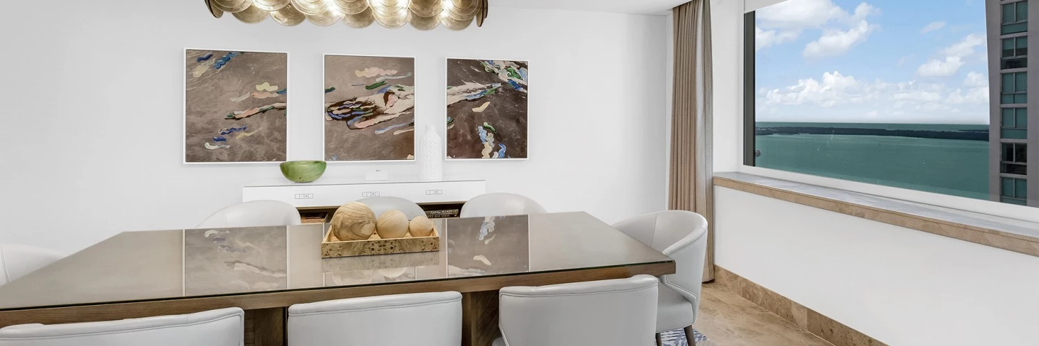 a room with a table and chairs