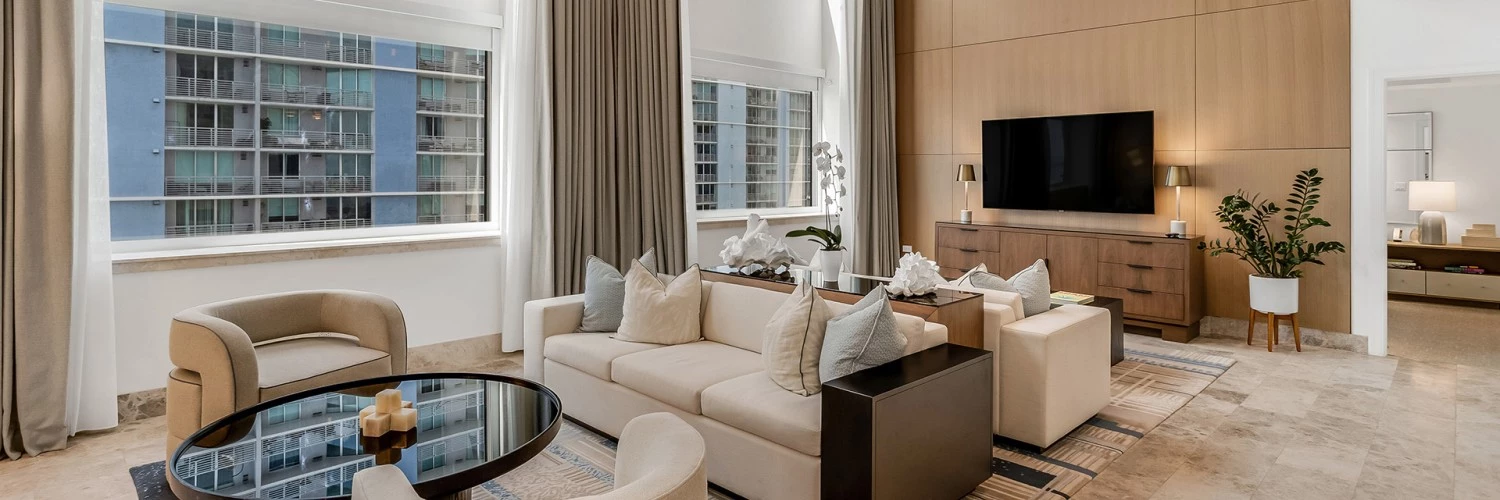 a living room with a couch and a television