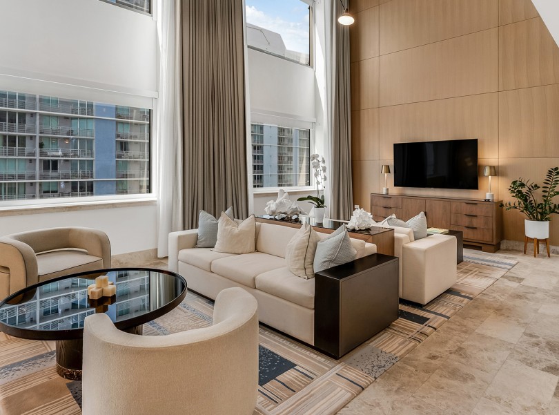a living room with a couch and a television