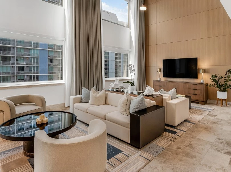 a living room with a couch and a television