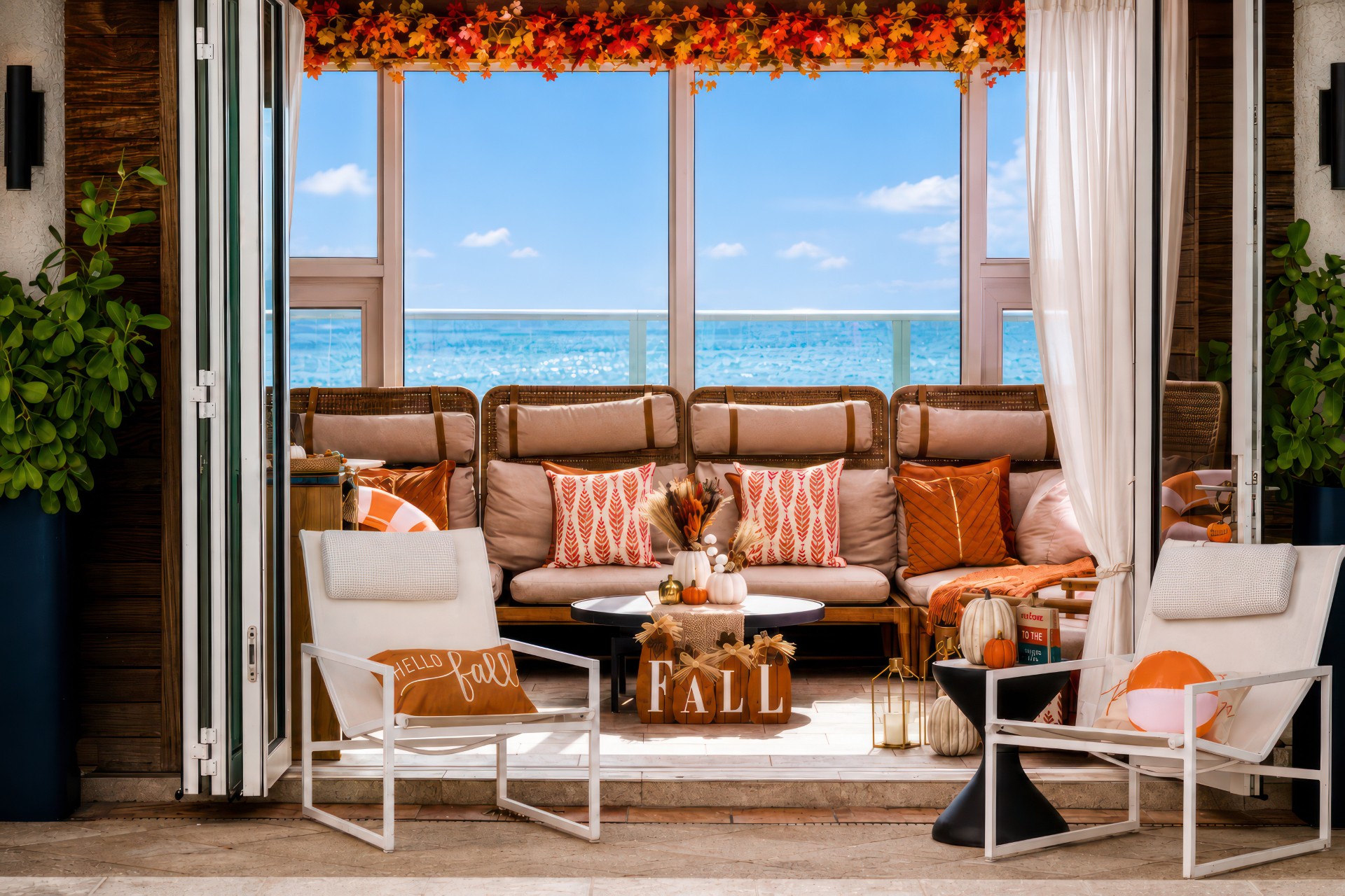 a patio with a couch and chairs