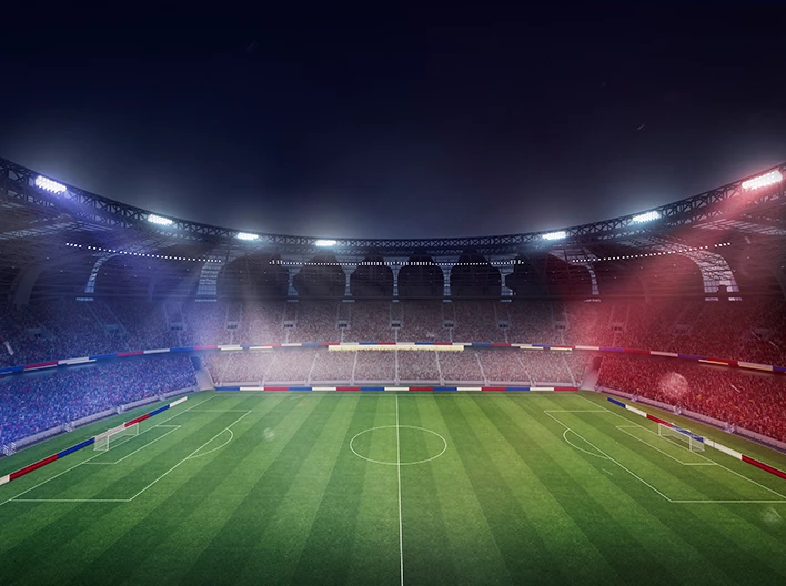 a football stadium with people in the stands