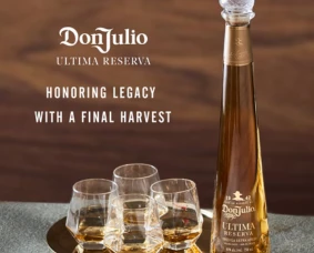 a bottle of liquor and glasses