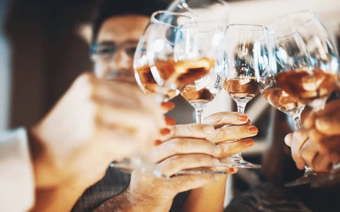 friends cheering with wine