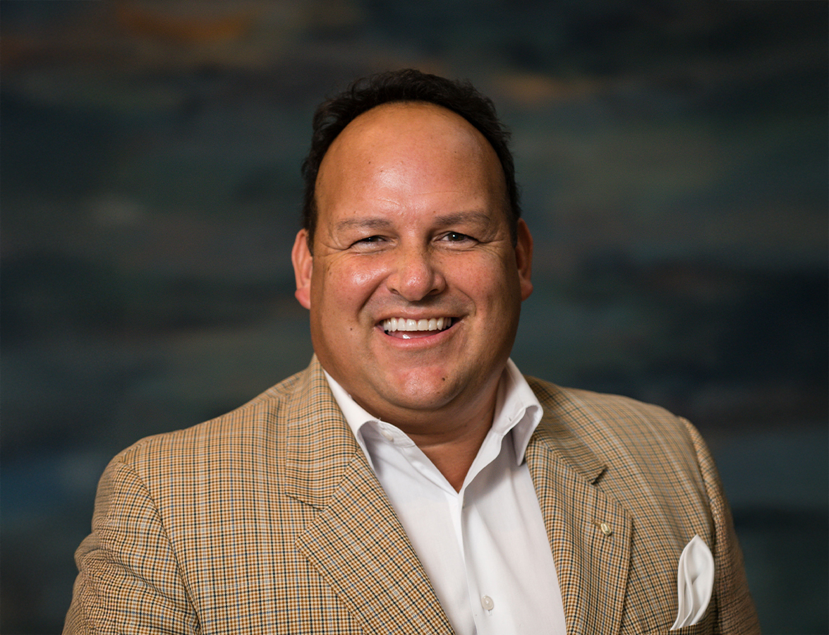 a man smiling for a picture