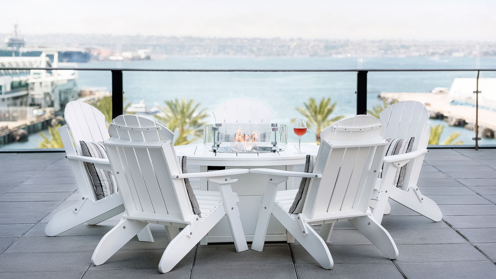a white table with chairs around it