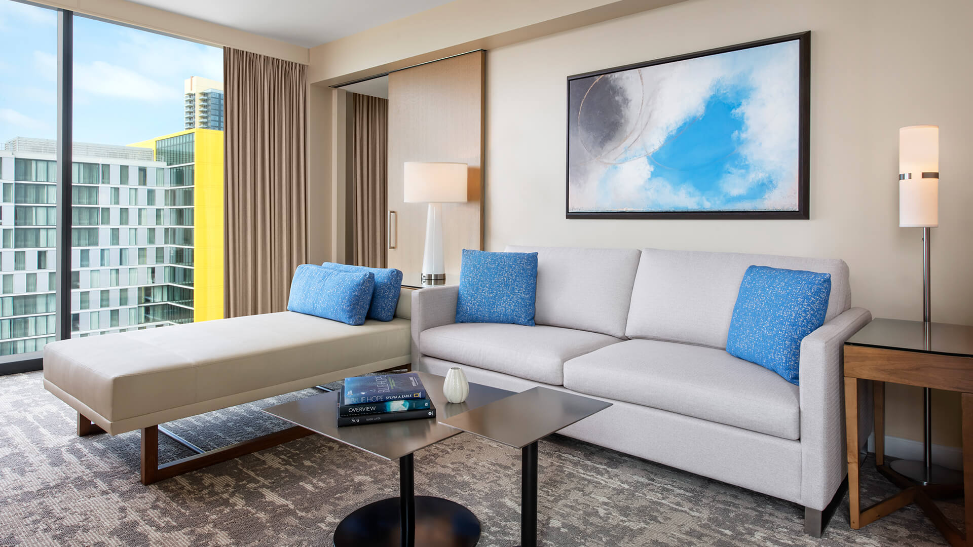 a living room with a couch and a table