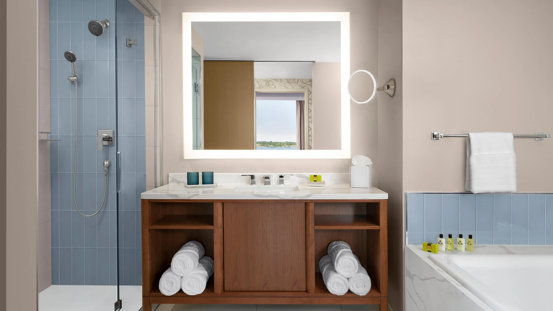 a bathroom with a mirror and a sink