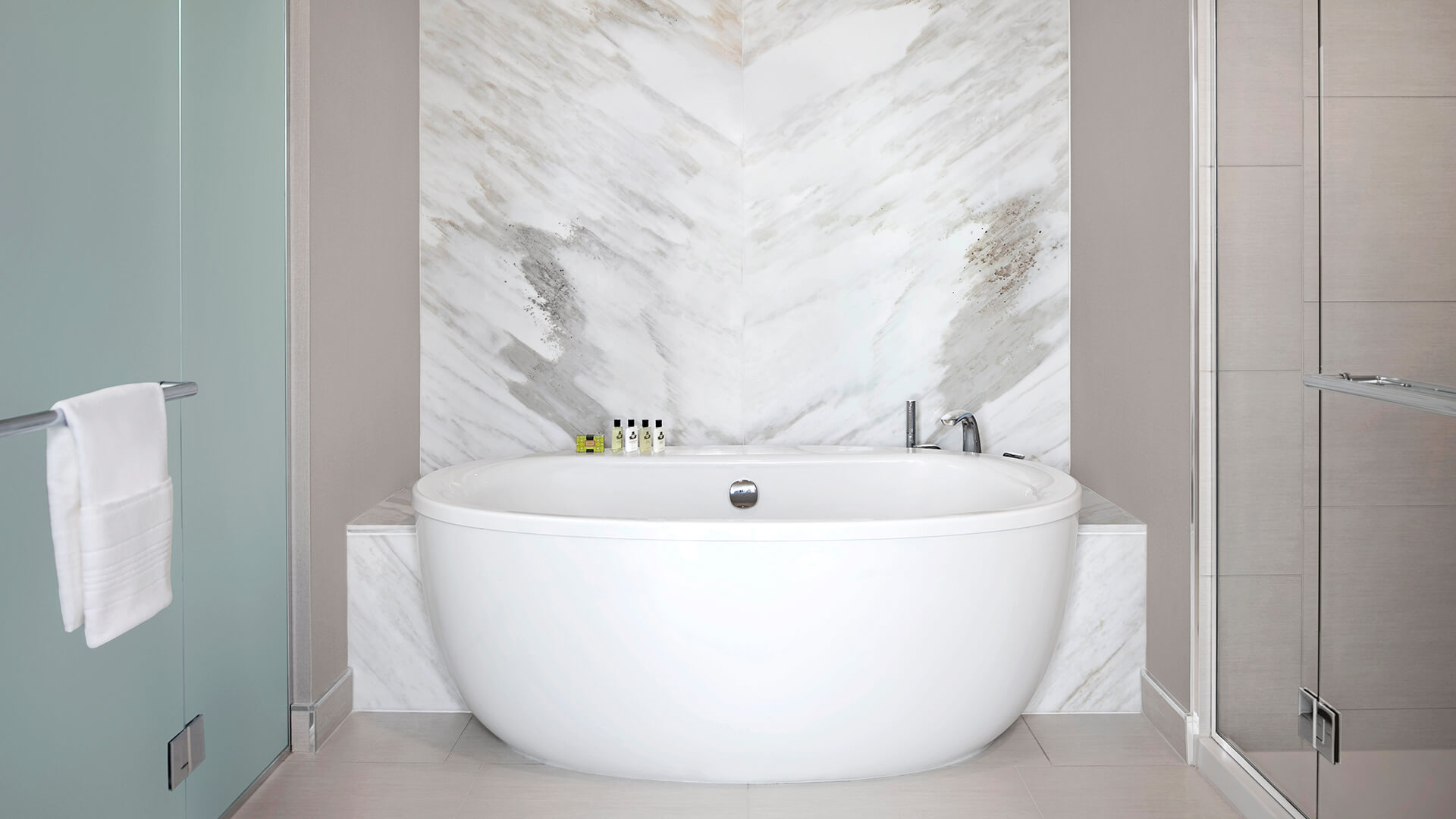 a white bathtub in a bathroom