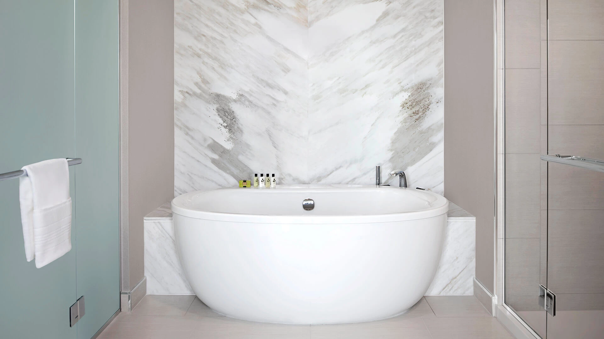 a white bathtub in a bathroom
