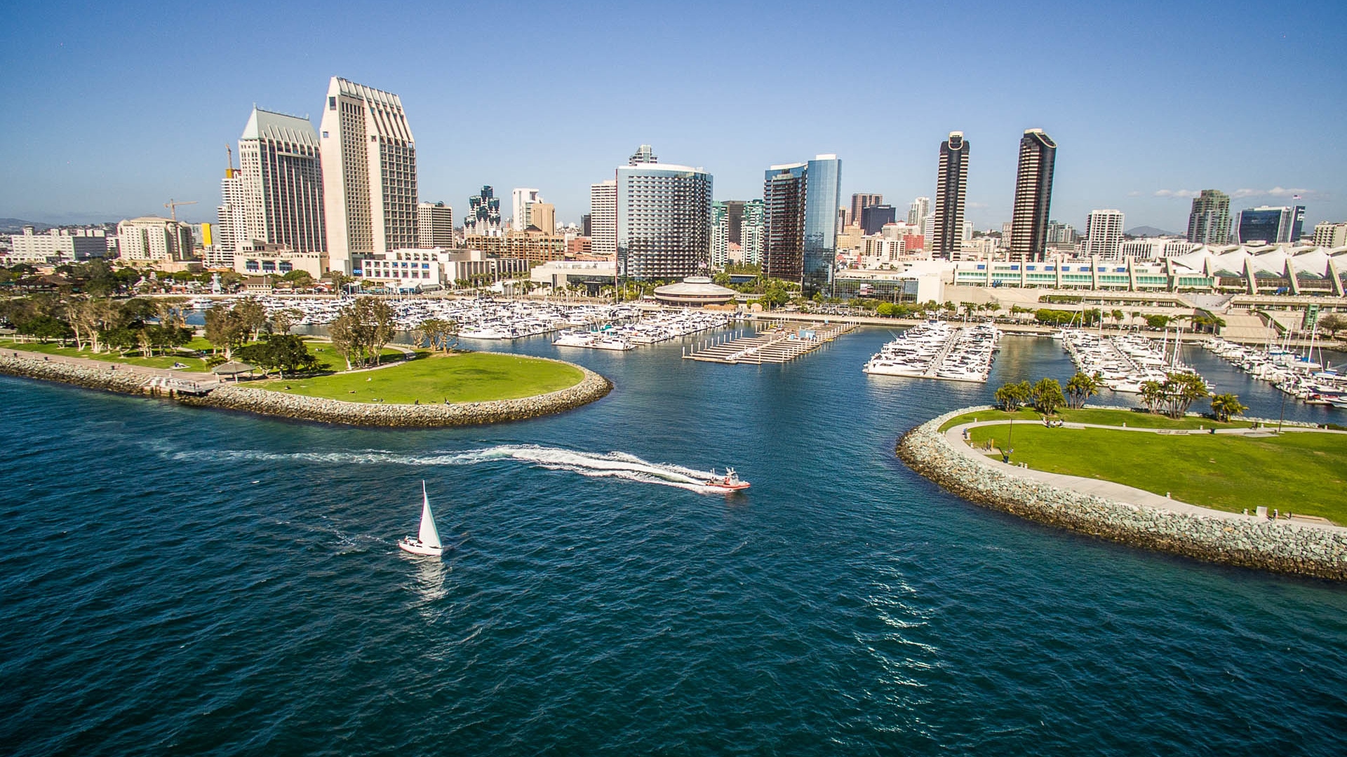 a city with boats and a marina