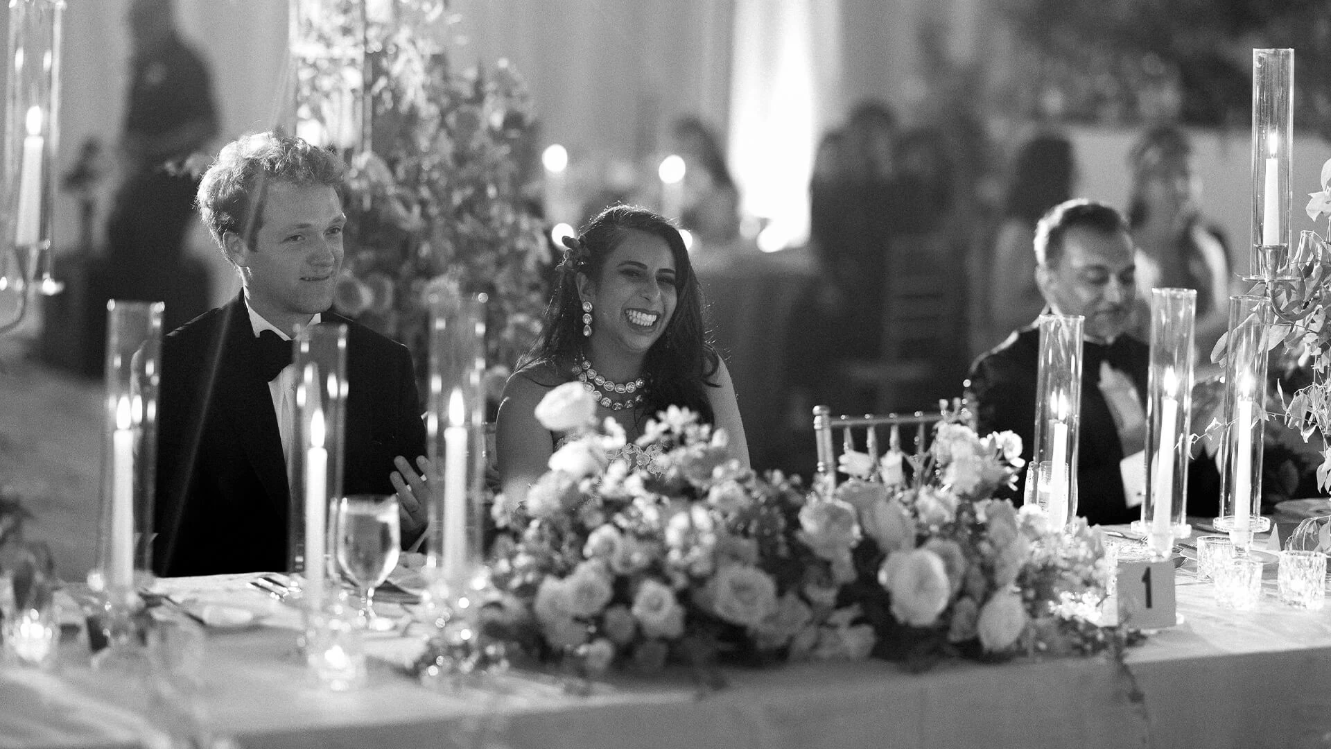 a group of people sitting at a table