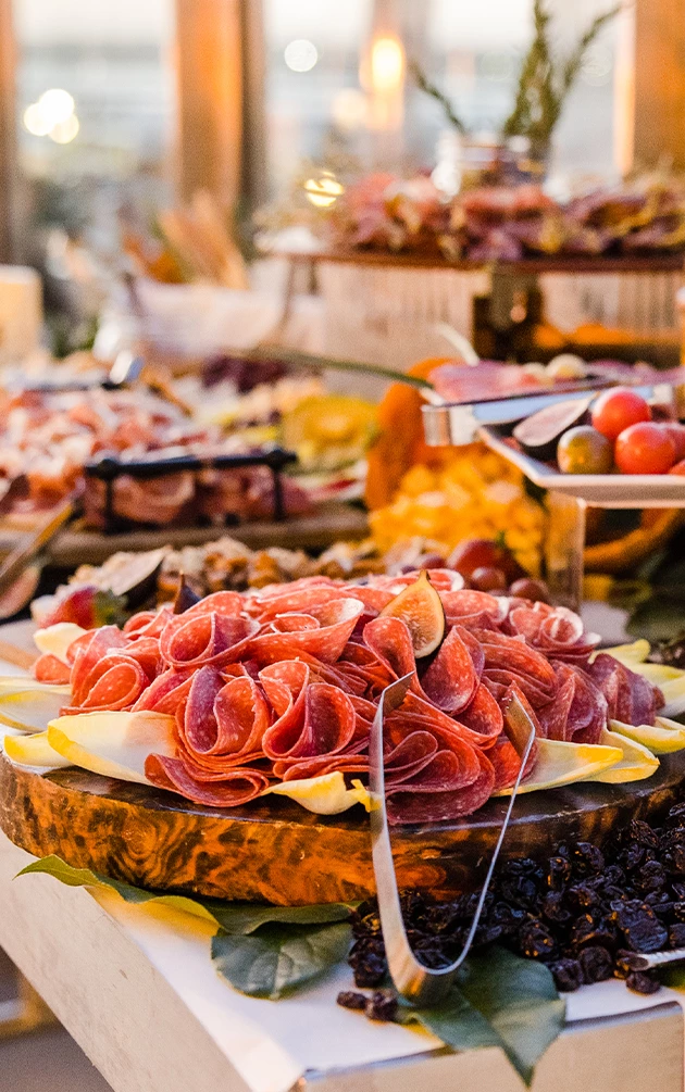 a platter of meat and vegetables