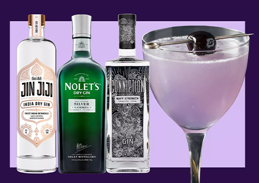 a group of bottles and a glass of liquid