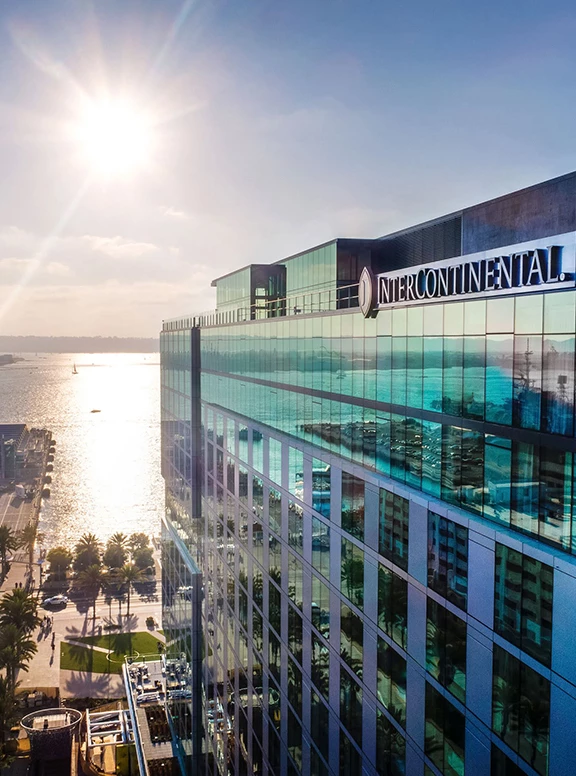 a building with a body of water and a body of water