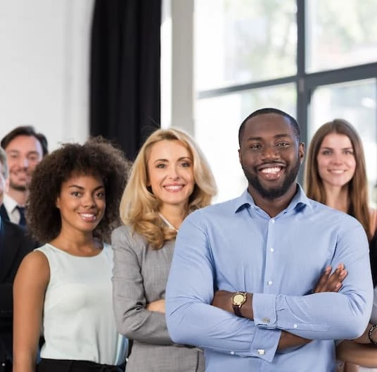 a group of people posing for a photo