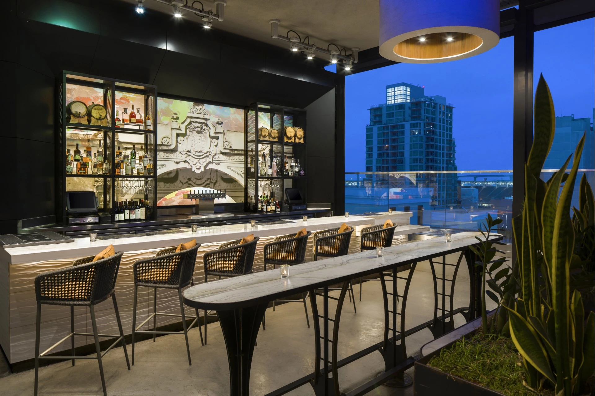 a bar with tables and chairs