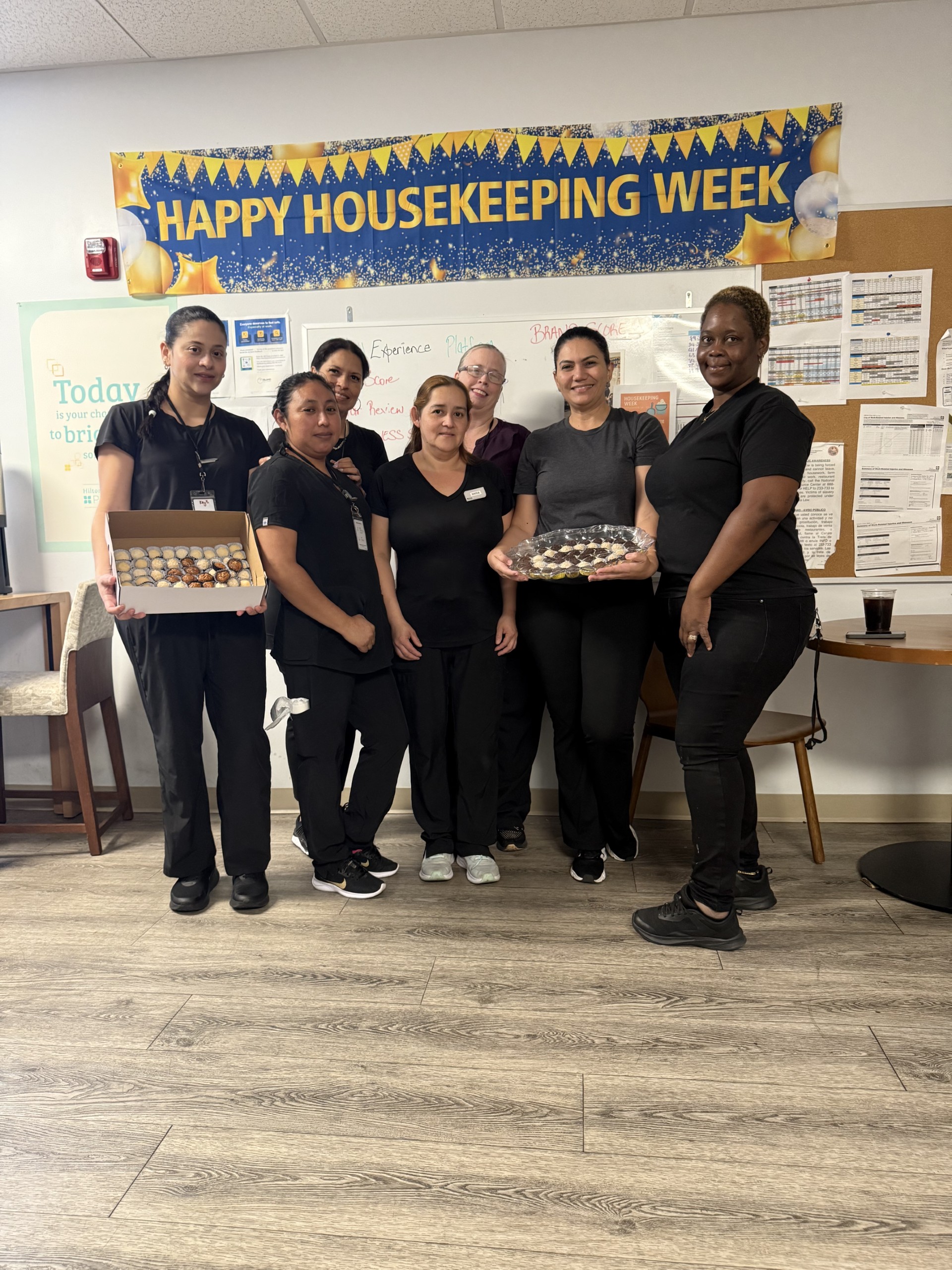 a group of people posing for a photo