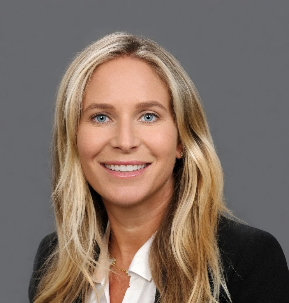 a woman with blonde hair smiling