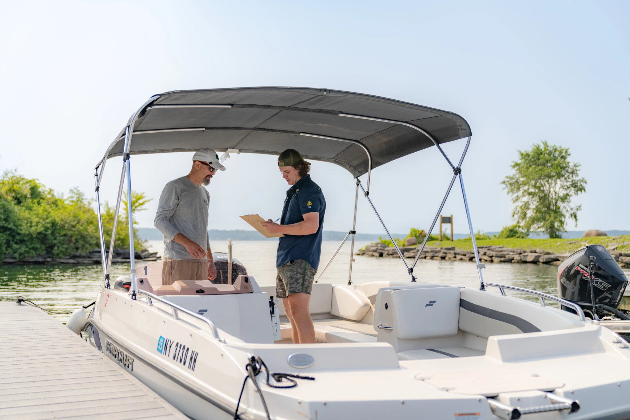 a man and woman on a boat