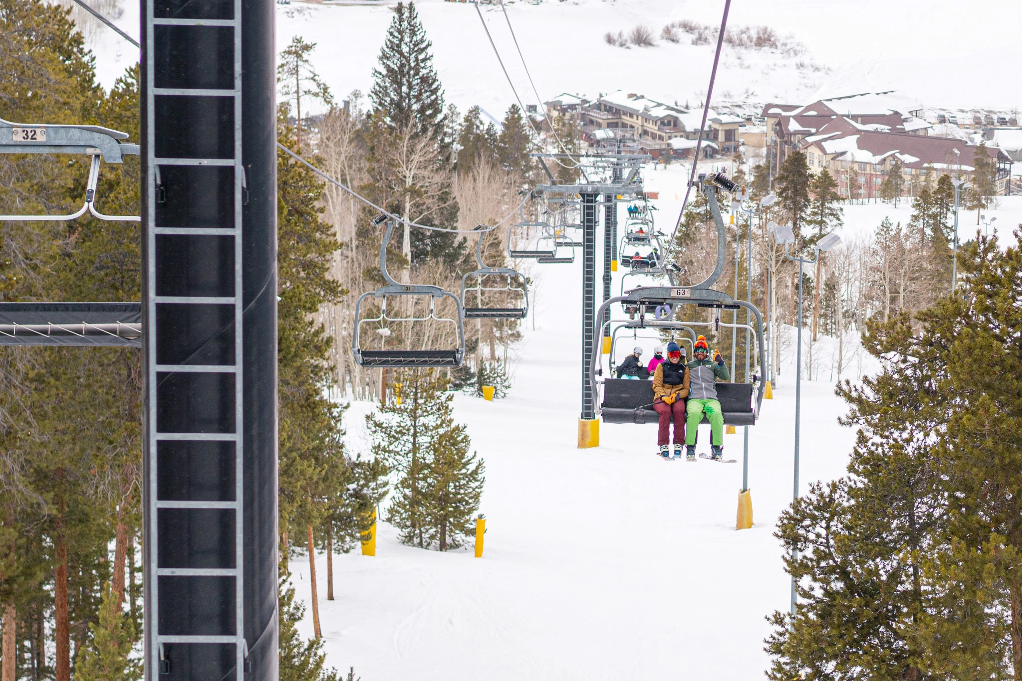 a group of people on a ski lift