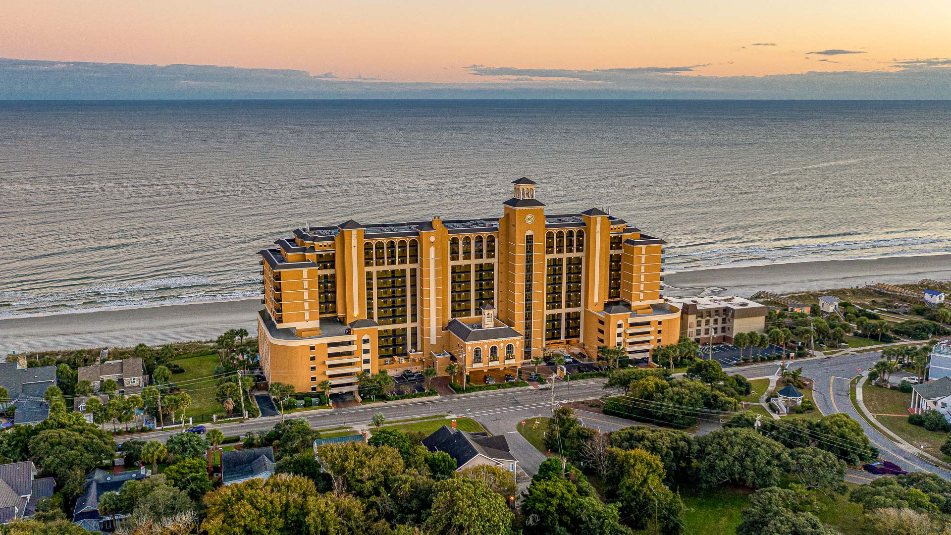 a large building next to a body of water