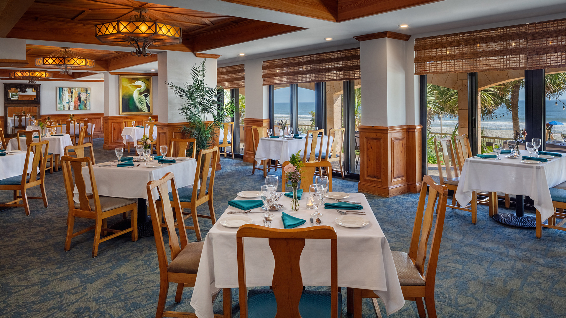 a restaurant with tables and chairs