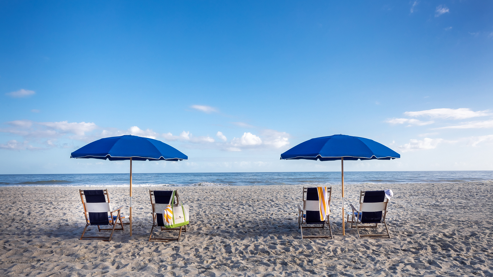 chairs and umbrellas on a beach