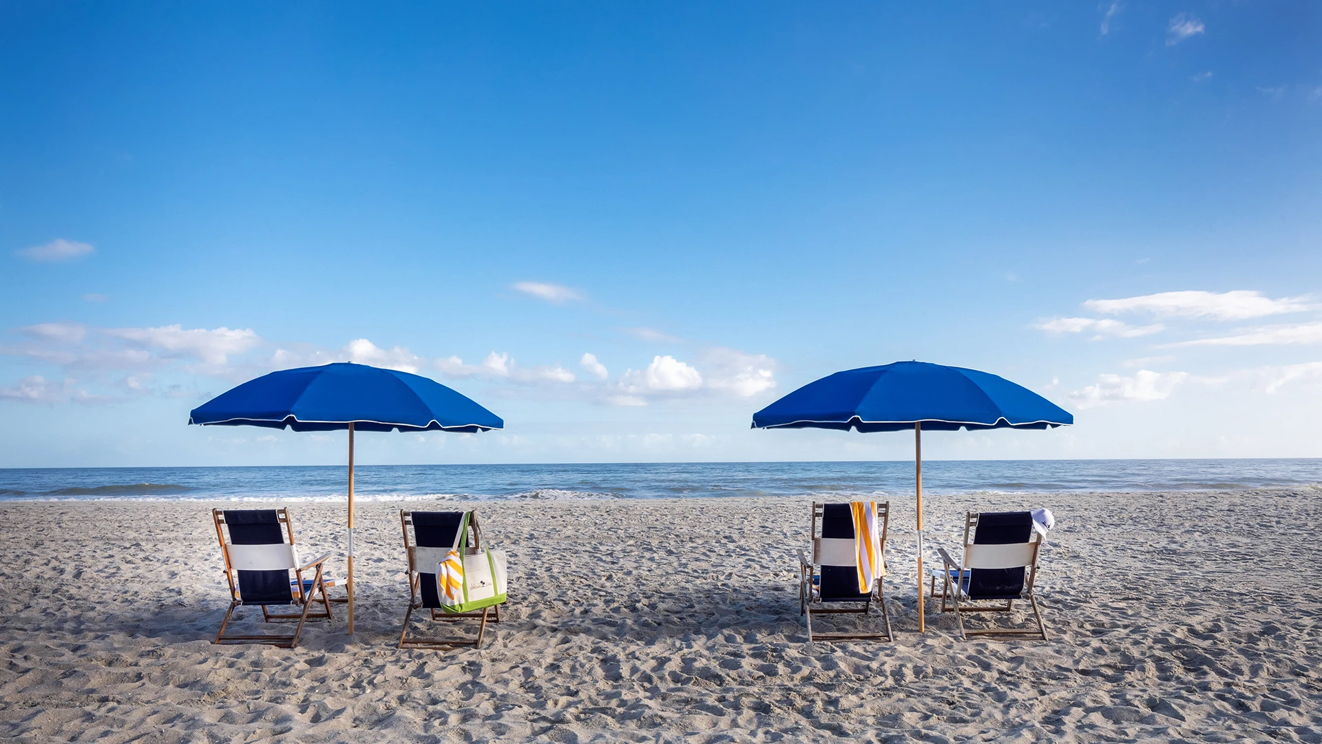 chairs and umbrellas on a beach