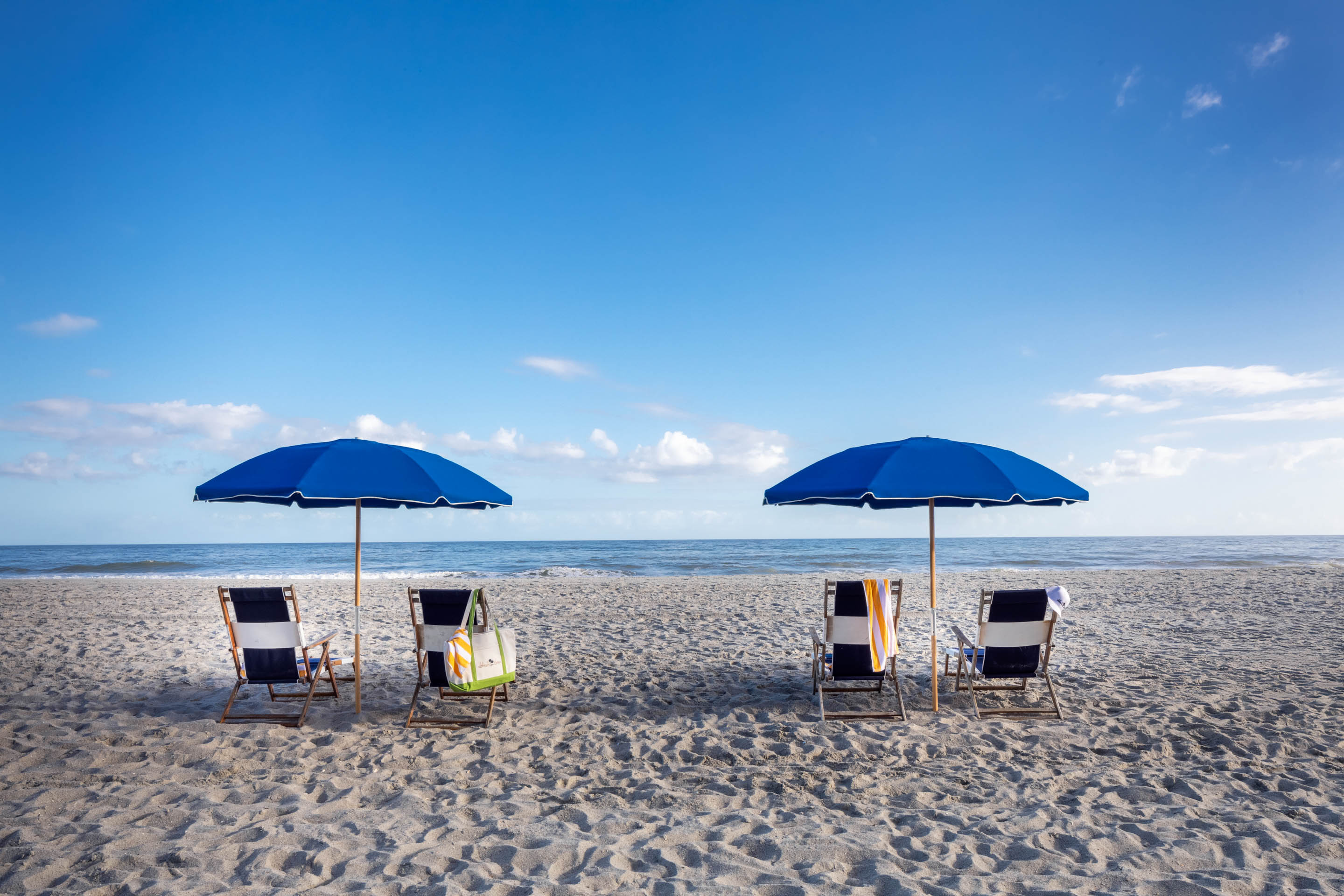 chairs and umbrellas on a beach