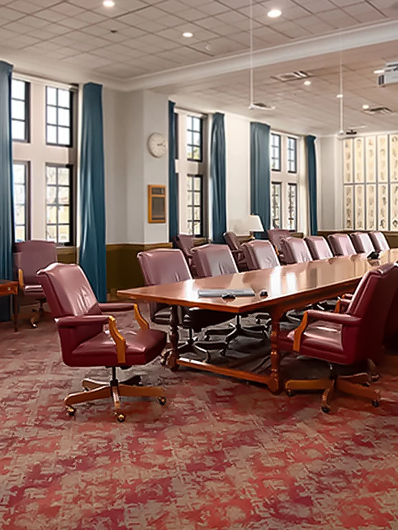 a room with a table and chairs