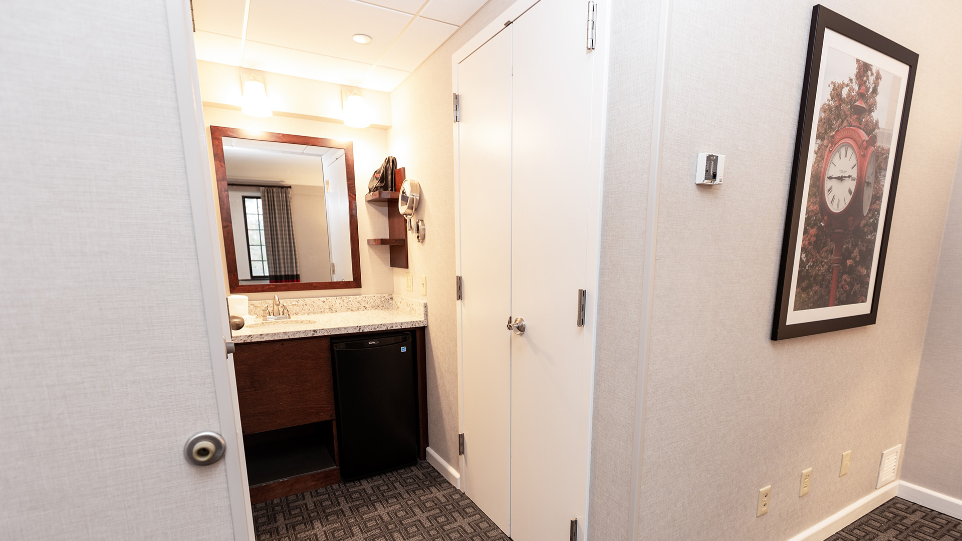 a bathroom with a sink and a mirror