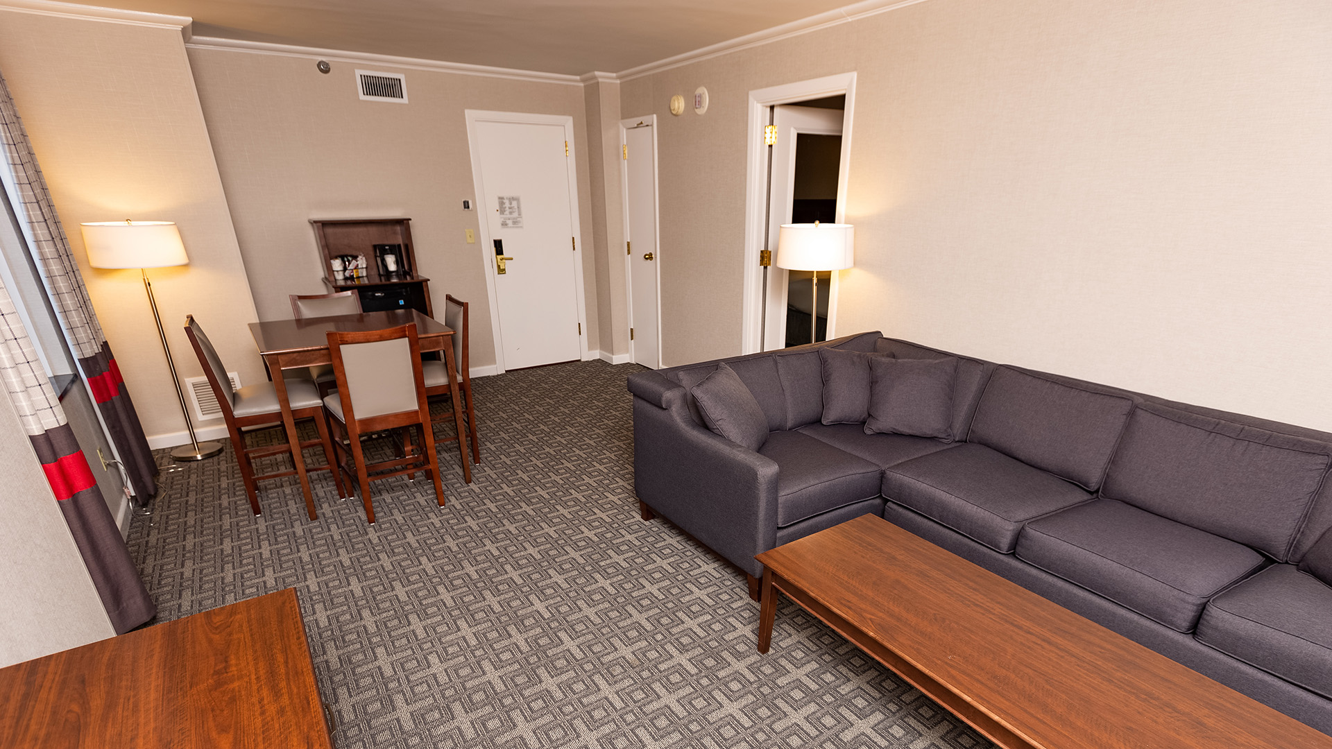 a living room with a couch and table