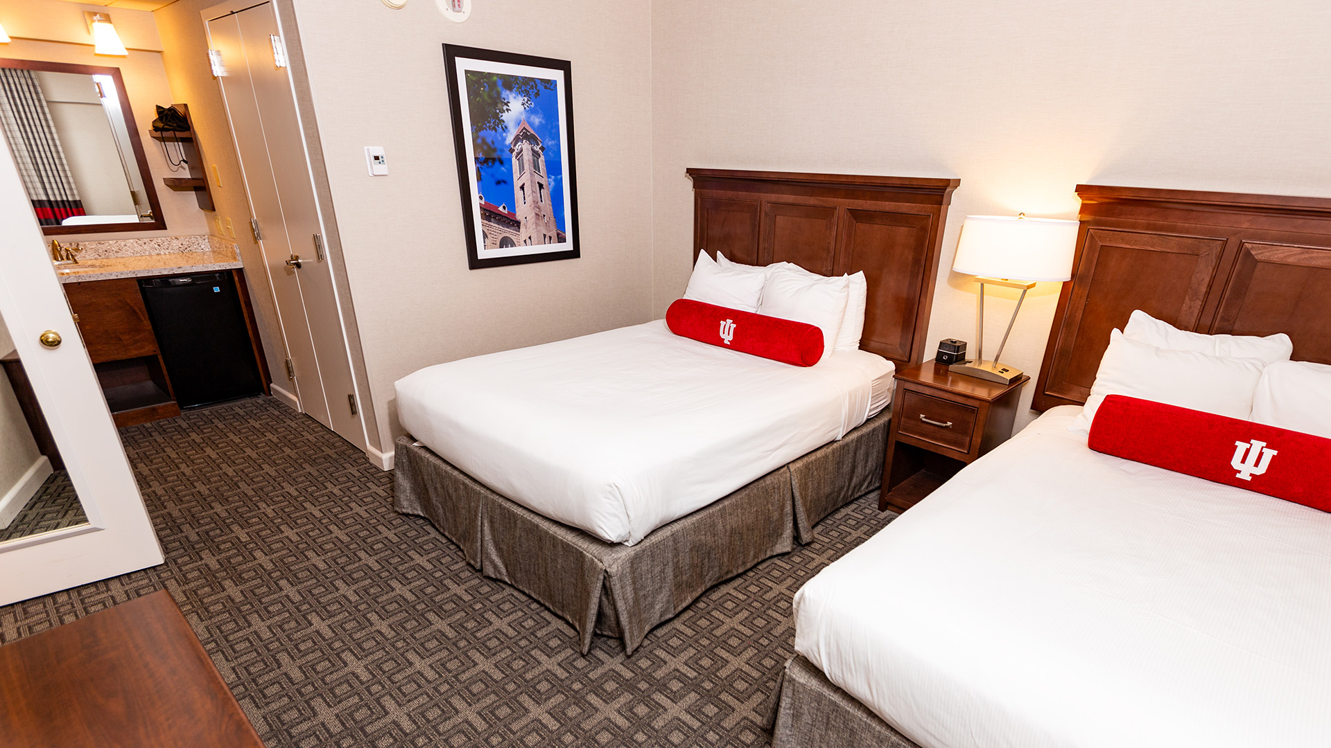 a hotel room with two beds