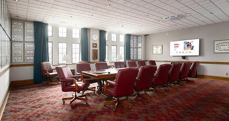a room with a table and chairs