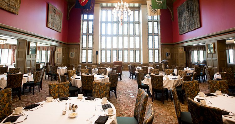 a room with tables and chairs