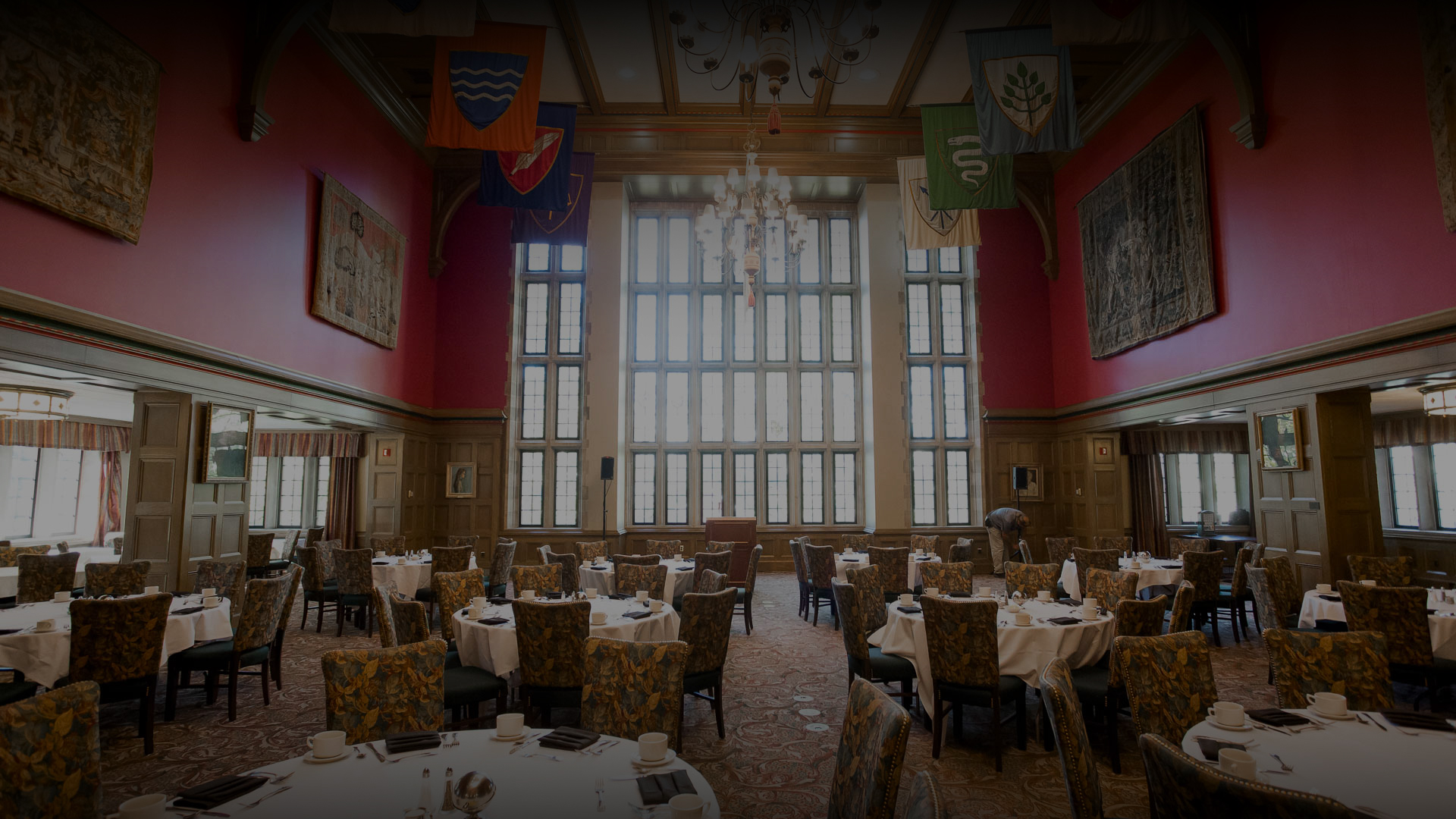 a room with tables and chairs