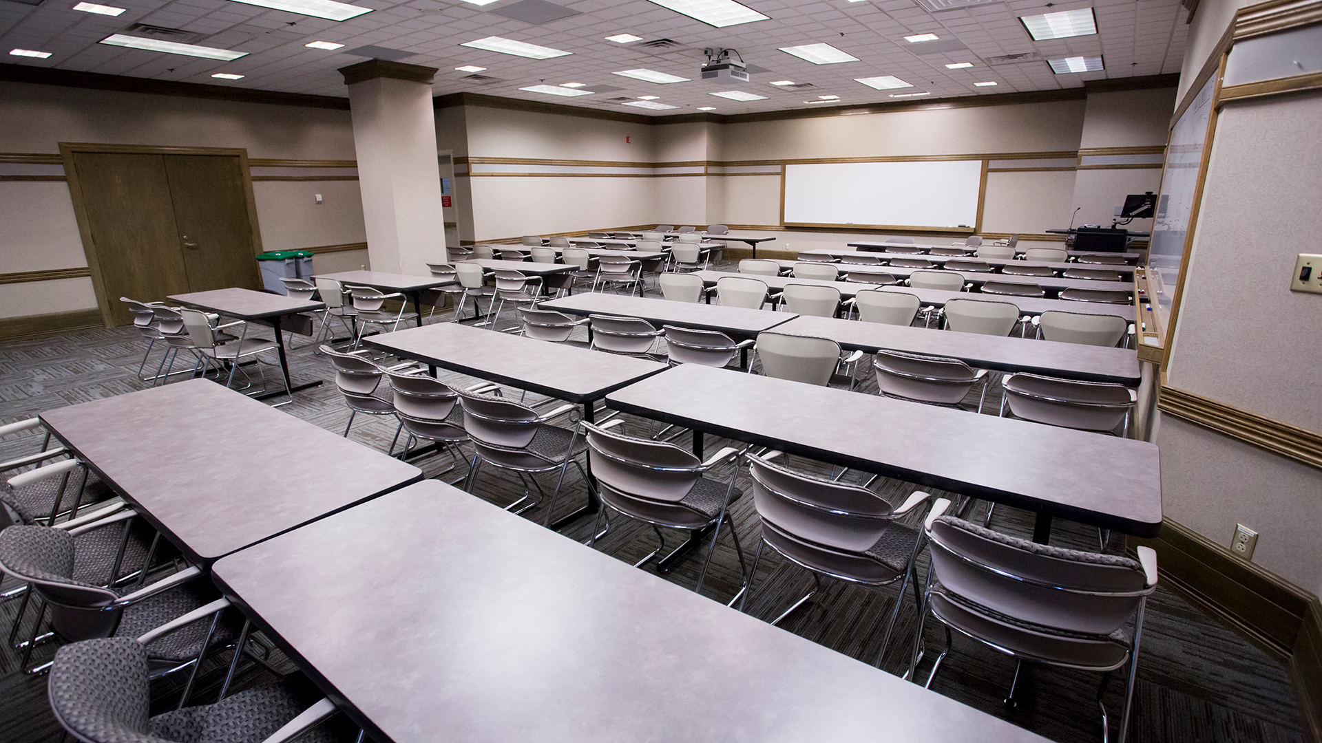 a room with tables and chairs