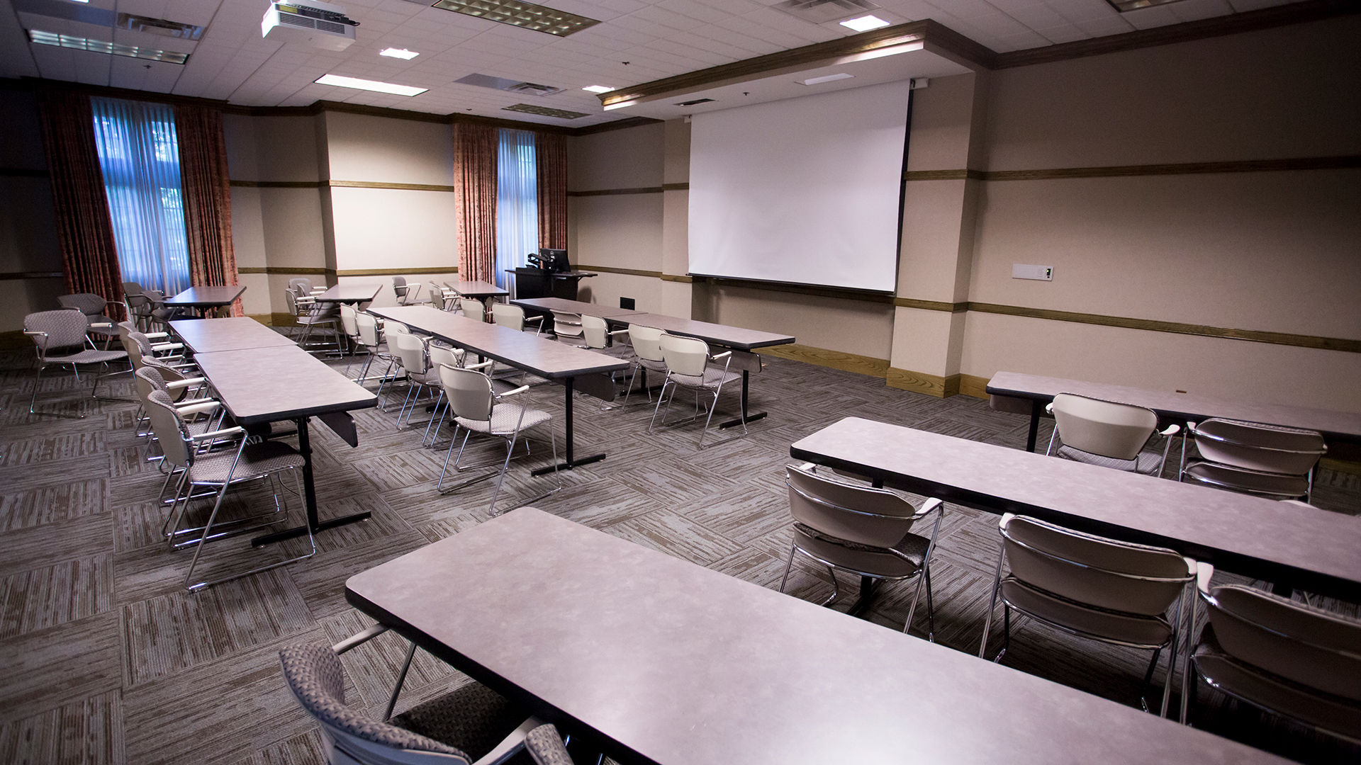 a room with tables and chairs