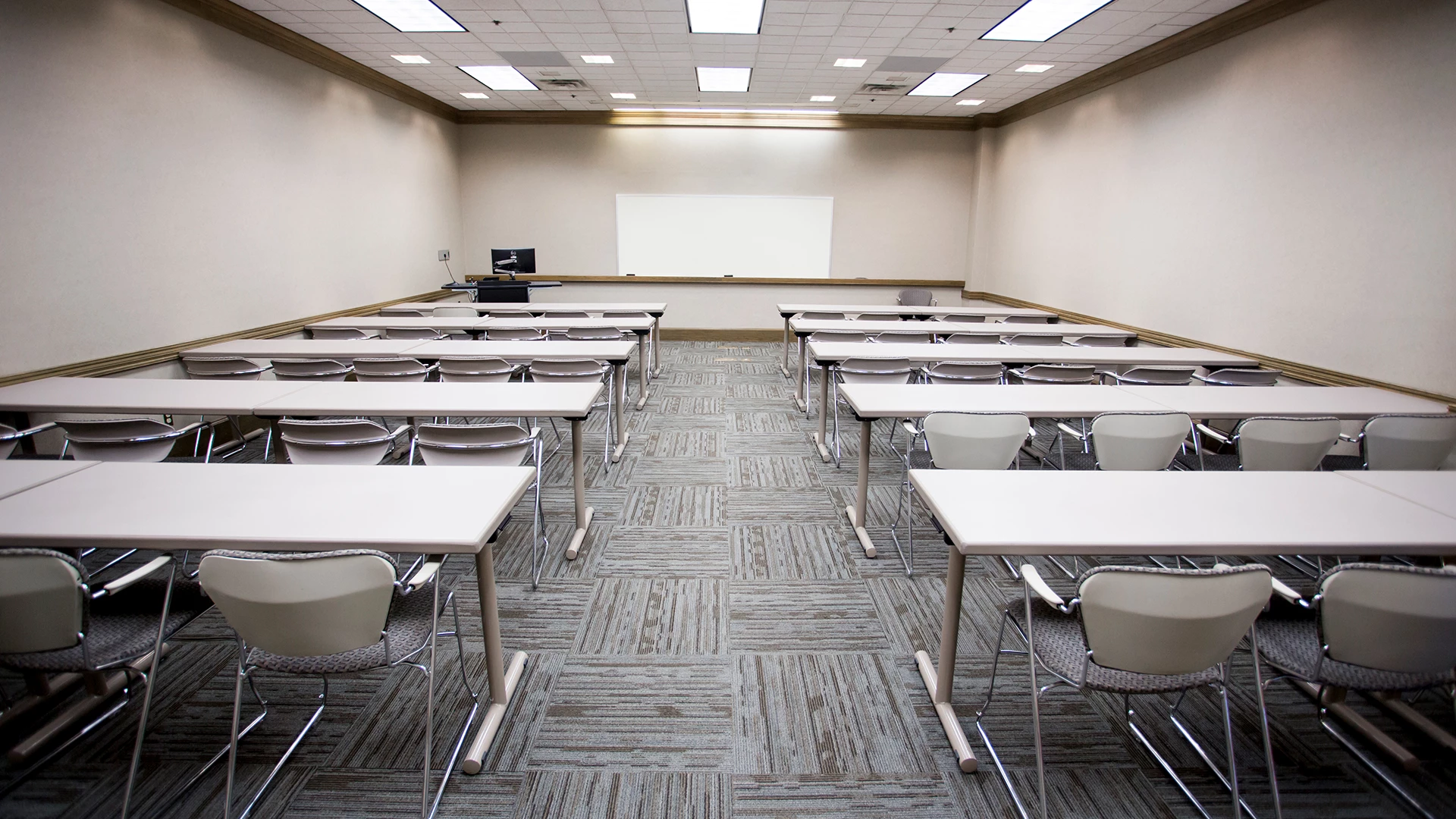 a room with tables and chairs