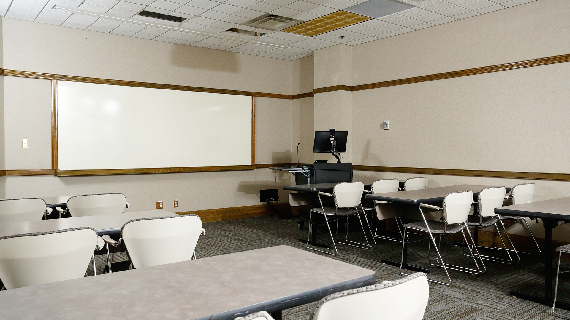 a room with tables and chairs