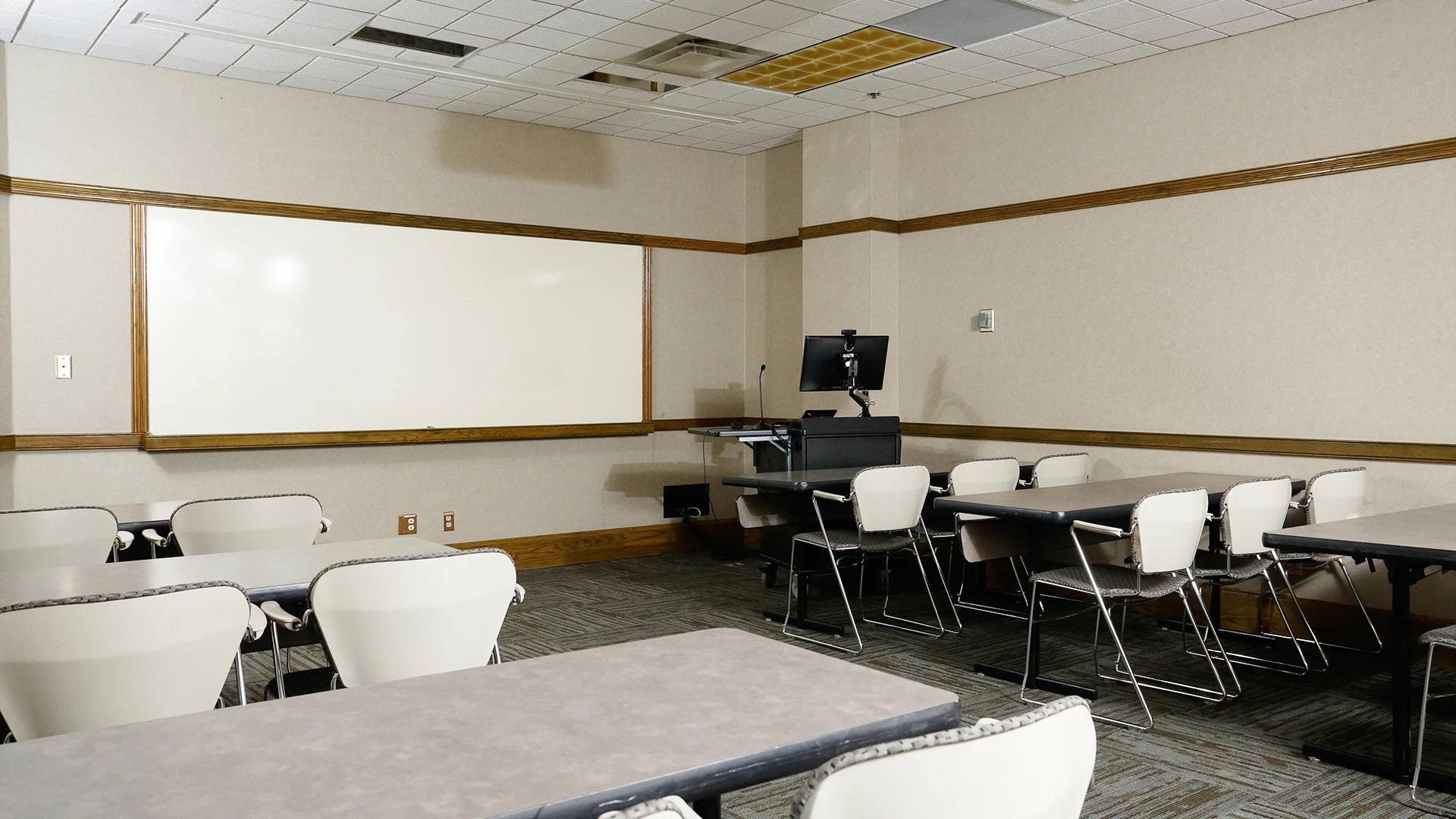a room with tables and chairs