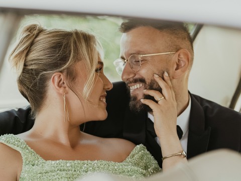a man and woman in a car