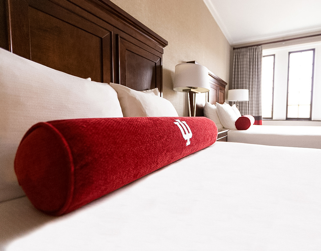 a red roll on a bed