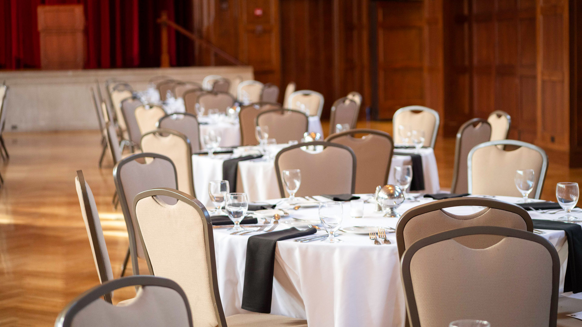 a group of tables set up in a room