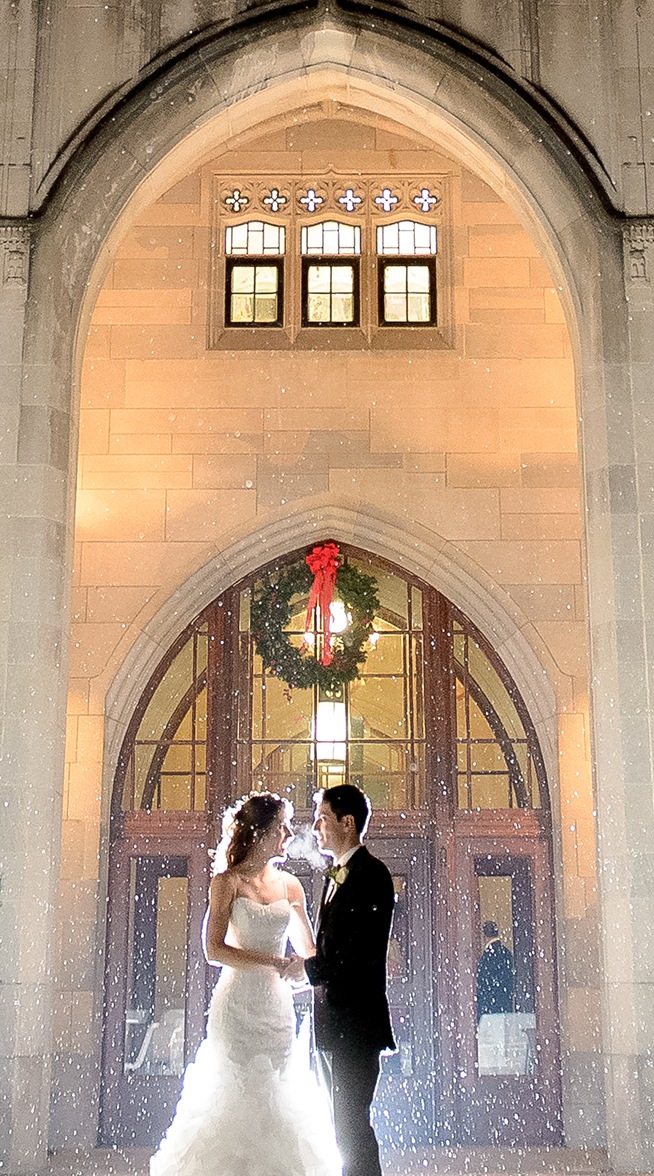 a bride and groom standing in front of a building