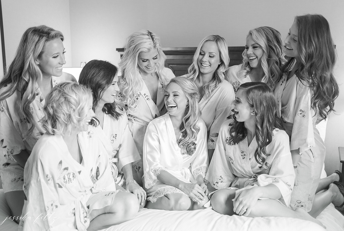 a group of women in white robes